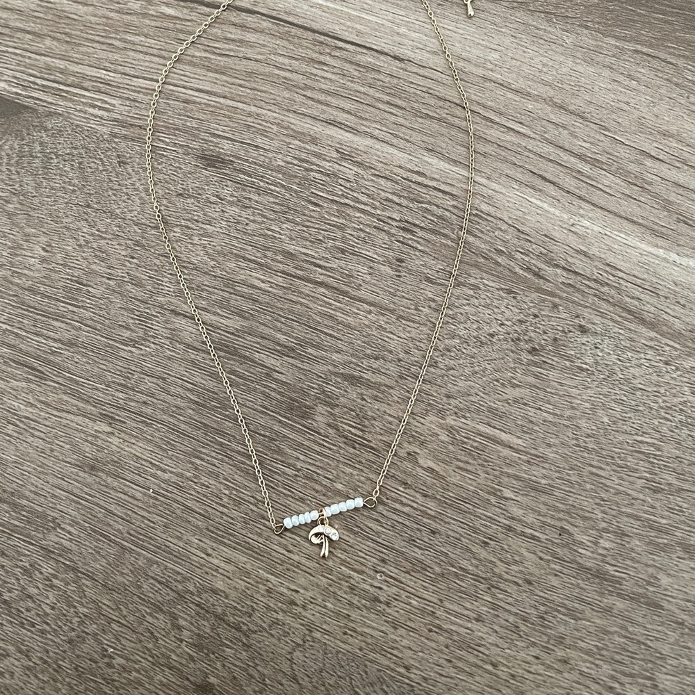 Gold mushroom necklace